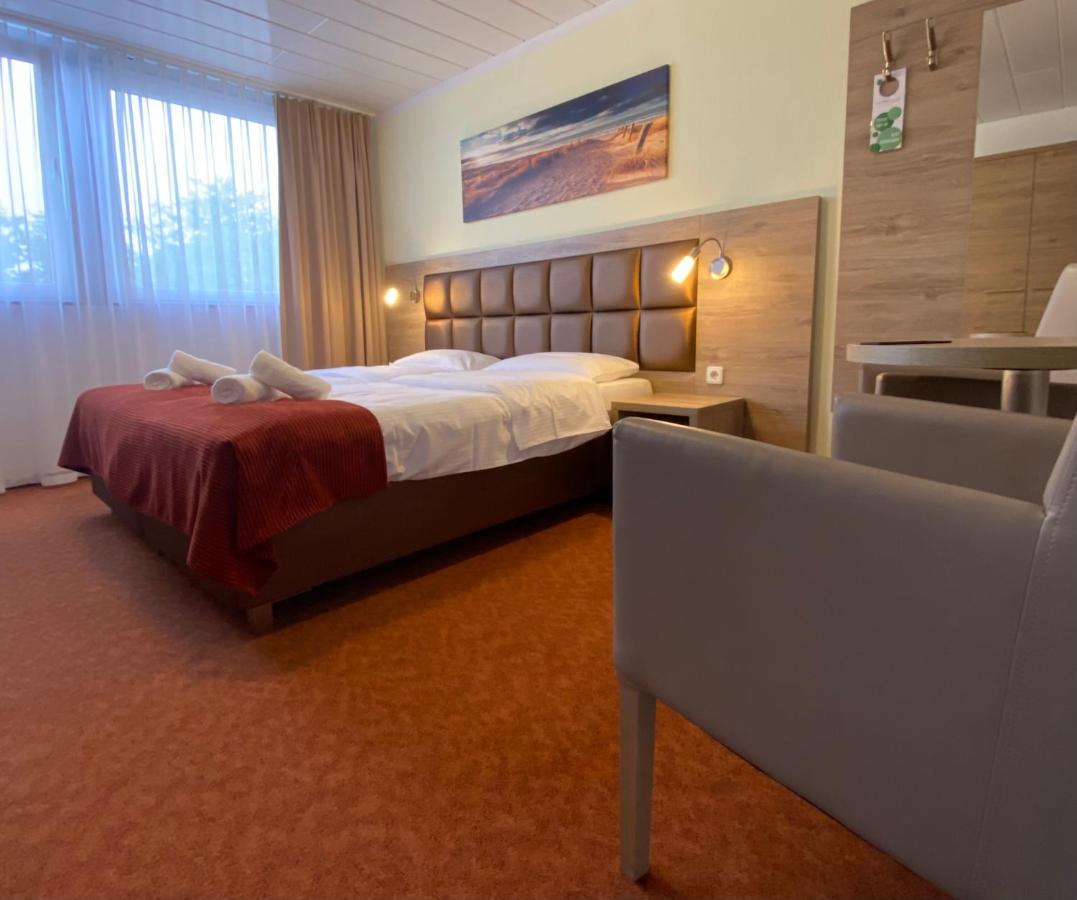 Strand Hotel Nordsee, Hotel Deichlaeufer Tossens Exterior foto